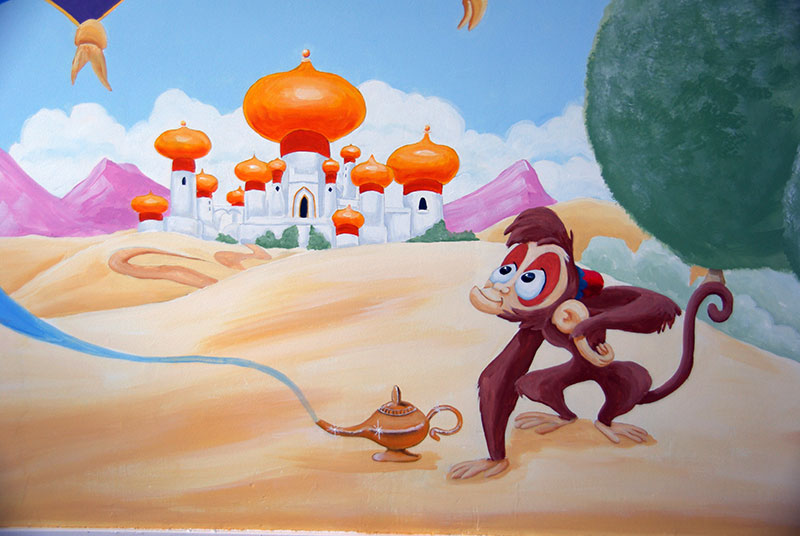muurschildering alladin en de geest aapje met toverlamp